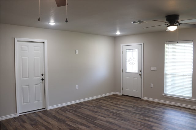 foyer entrance featuring ceiling fan and dark hardwood / wood-style flooring