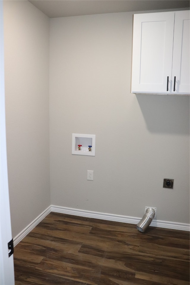 laundry area with washer hookup, cabinets, dark hardwood / wood-style flooring, and electric dryer hookup