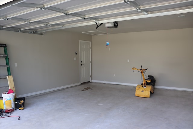 garage featuring a garage door opener