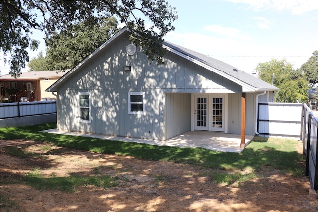 back of house with a patio and french doors