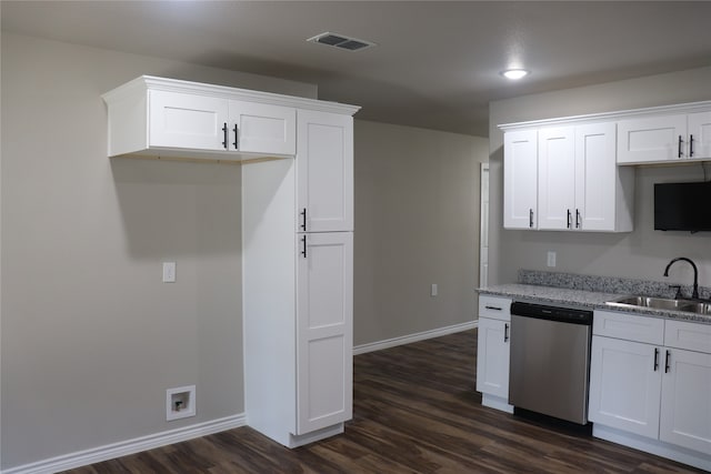 kitchen featuring dishwasher, white cabinets, and sink