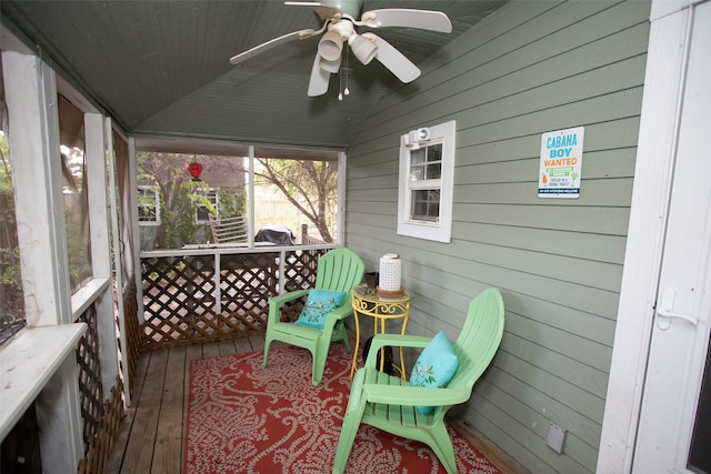 exterior space featuring ceiling fan