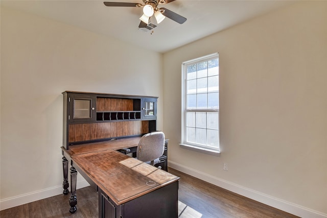 office area featuring ceiling fan and dark hardwood / wood-style flooring