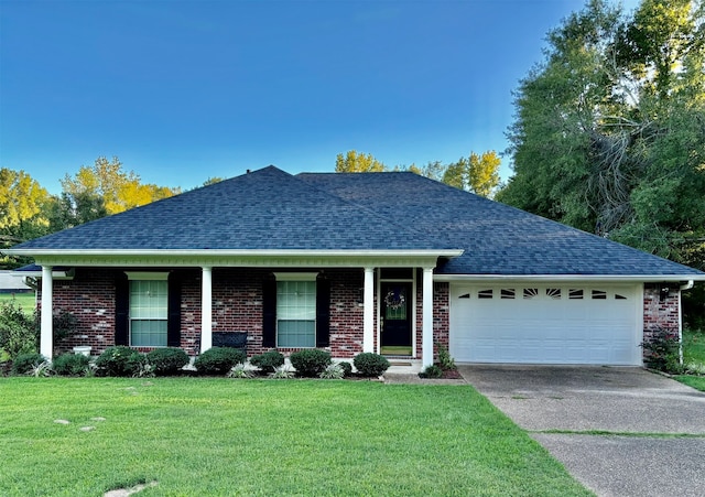 ranch-style home featuring a front yard and a garage