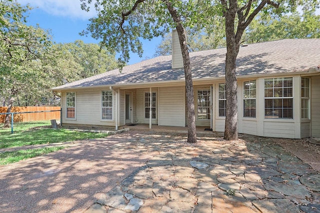 view of front of property featuring a patio