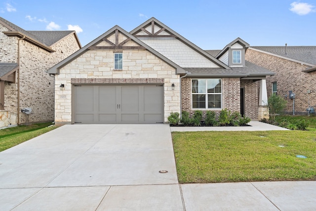 craftsman-style home featuring a front lawn and a garage