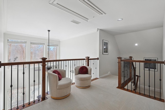 living area with carpet flooring and vaulted ceiling