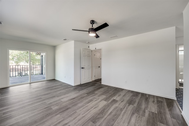 spare room featuring ceiling fan and wood-type flooring