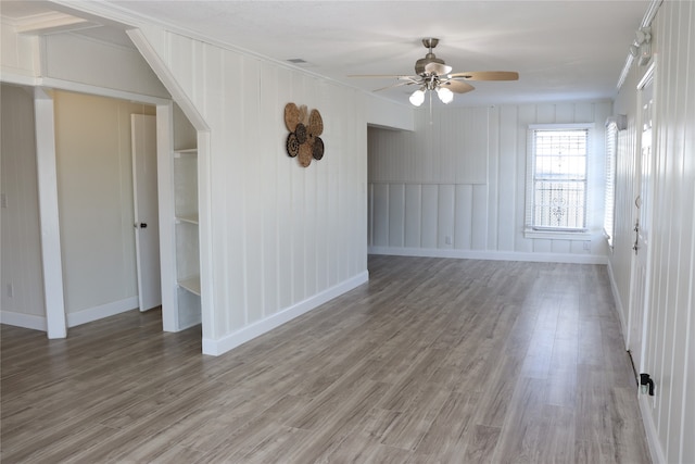 spare room featuring hardwood / wood-style flooring and ceiling fan