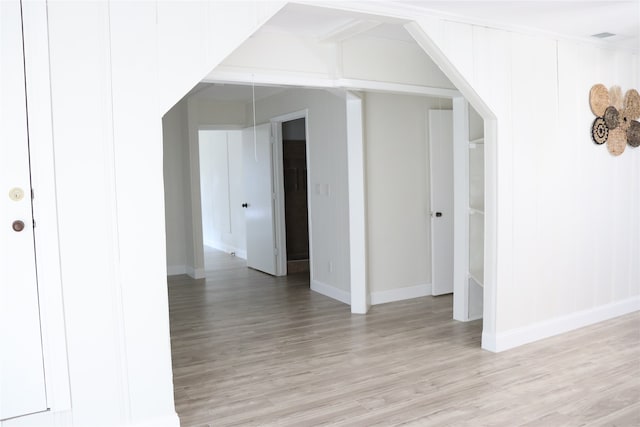 bonus room with light wood-type flooring