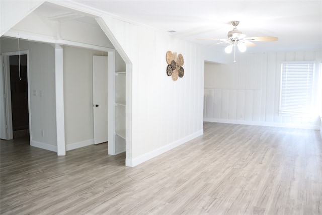 unfurnished room with light hardwood / wood-style flooring and ceiling fan