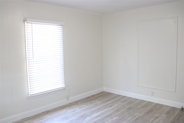 unfurnished room featuring light hardwood / wood-style floors