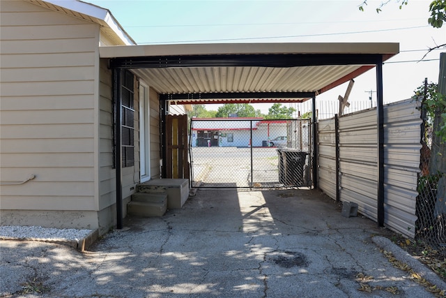 view of parking / parking lot with a carport