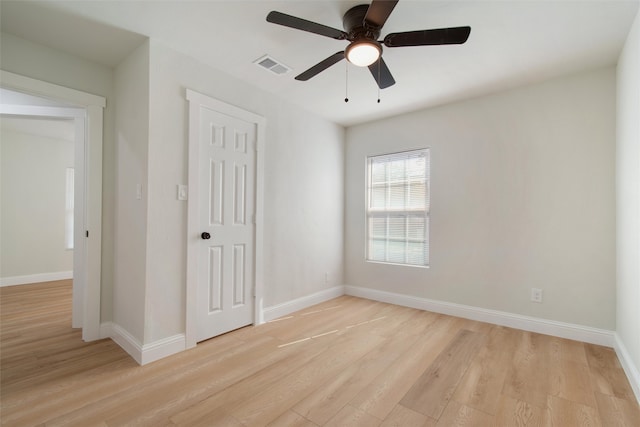 unfurnished room featuring ceiling fan and light hardwood / wood-style flooring