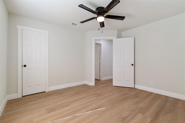 unfurnished bedroom featuring ceiling fan and light hardwood / wood-style flooring