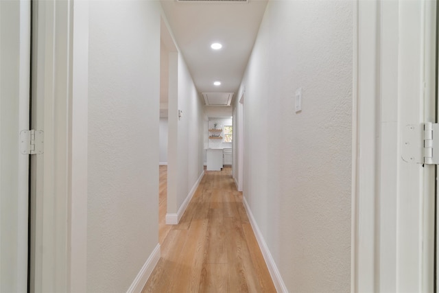 hallway featuring light hardwood / wood-style floors