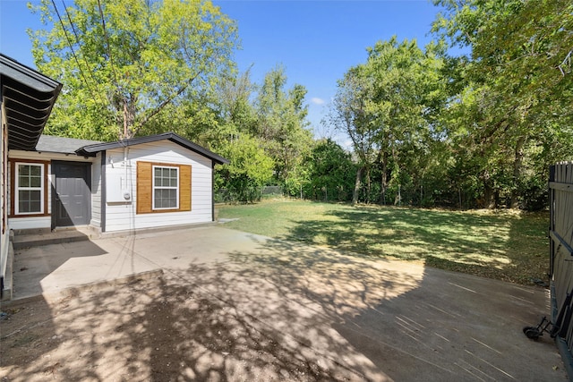 exterior space featuring a yard and a patio area