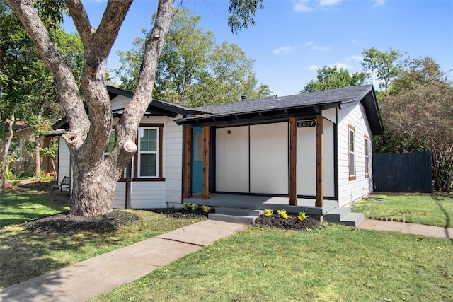 view of front of home with a front yard