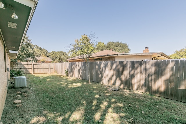 view of yard with central AC unit