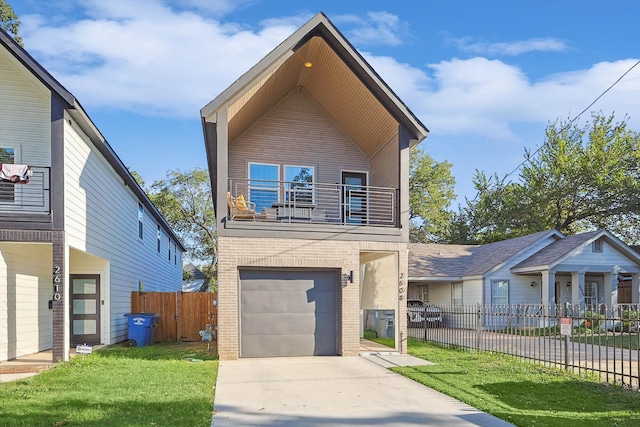 view of front of property with a front lawn, a garage, and a balcony