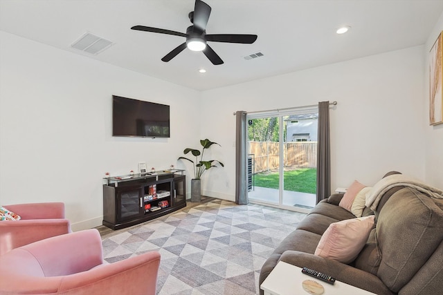 living room featuring ceiling fan