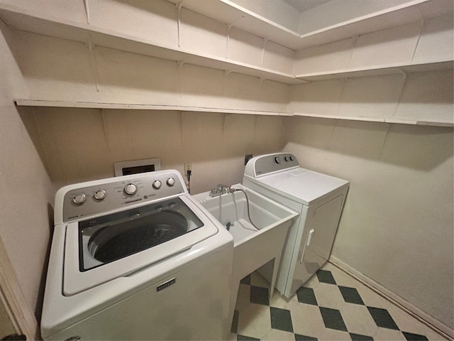 laundry area with washer and dryer