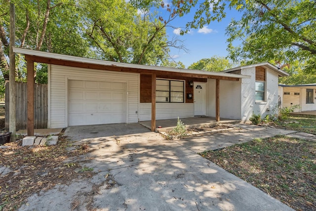 single story home with a garage