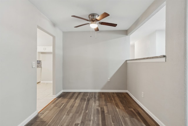 unfurnished room with wood-type flooring and ceiling fan