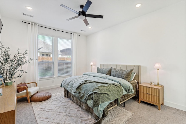 carpeted bedroom featuring ceiling fan