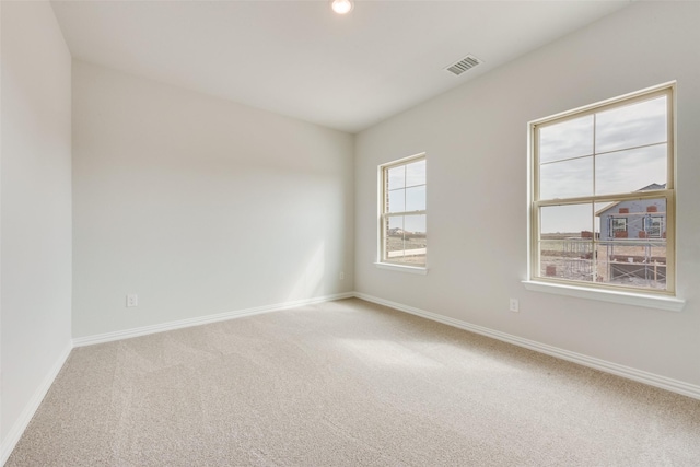 view of carpeted spare room