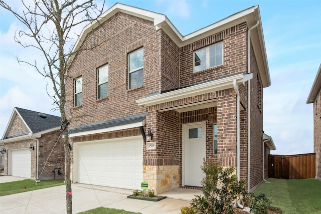 view of front of property with a garage