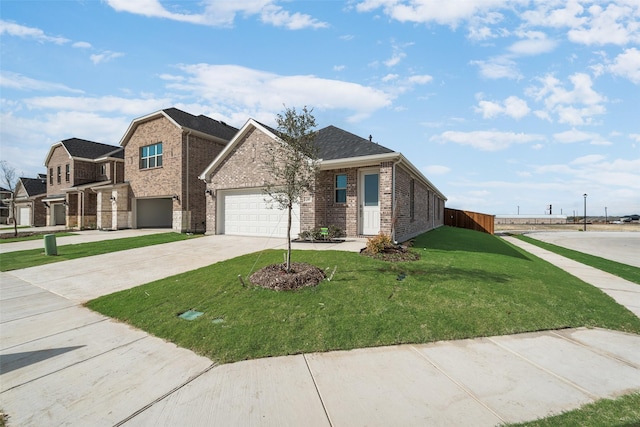 view of front of house with a garage and a front lawn