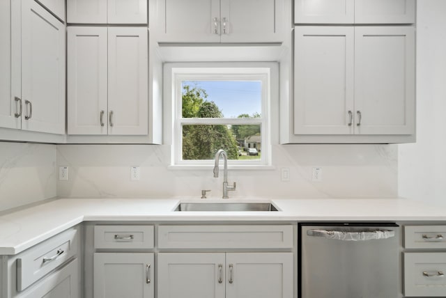 kitchen featuring dishwasher and sink