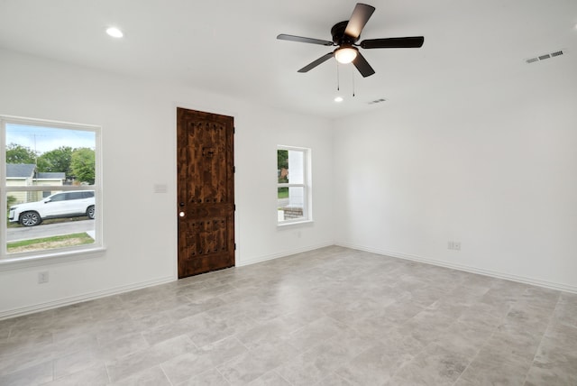 empty room featuring ceiling fan