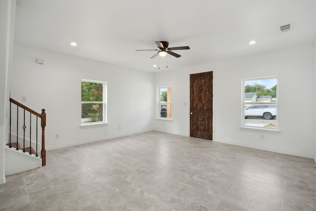 empty room featuring ceiling fan