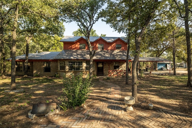 view of front of property featuring a patio