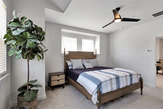 carpeted bedroom with ceiling fan