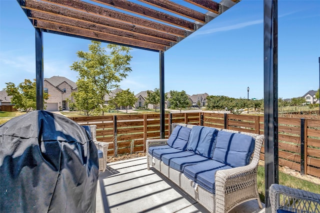 view of patio with an outdoor living space and a pergola