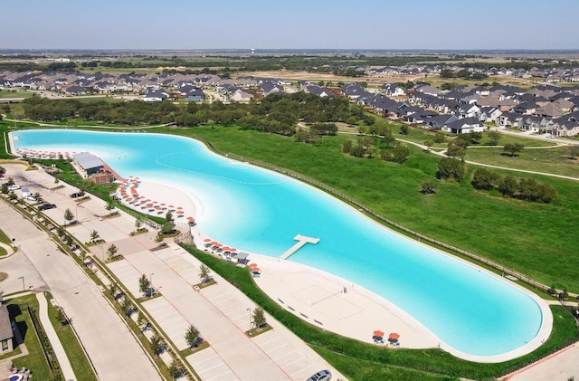 view of swimming pool with a diving board and a patio