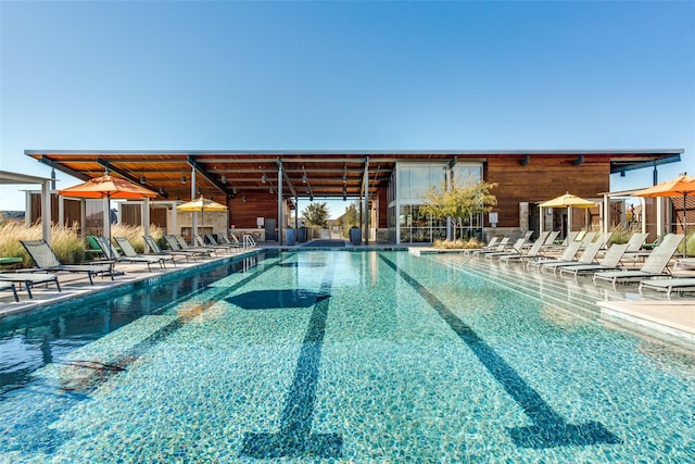 view of pool featuring a patio area