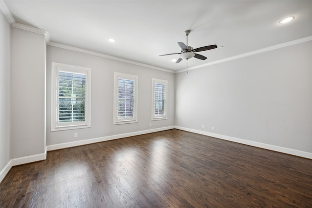 spare room featuring crown molding, dark hardwood / wood-style floors, and ceiling fan