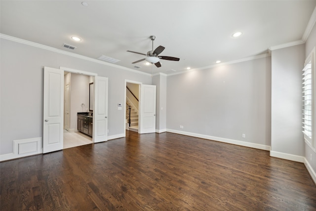 unfurnished room with crown molding, wood-type flooring, and ceiling fan