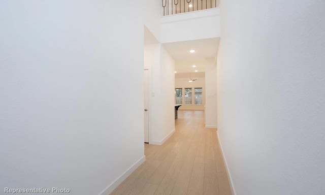 2414 Plumeria Ln, Celina, TX 75009 - hall with recessed lighting, light wood finished floors, and baseboards