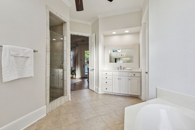 bathroom with ceiling fan, vanity, crown molding, plus walk in shower, and tile patterned flooring