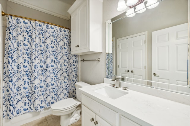 full bathroom with toilet, tile patterned flooring, shower / bath combo with shower curtain, ornamental molding, and vanity