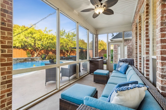 sunroom / solarium with ceiling fan