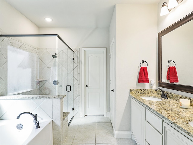 bathroom with vanity, independent shower and bath, and tile patterned flooring