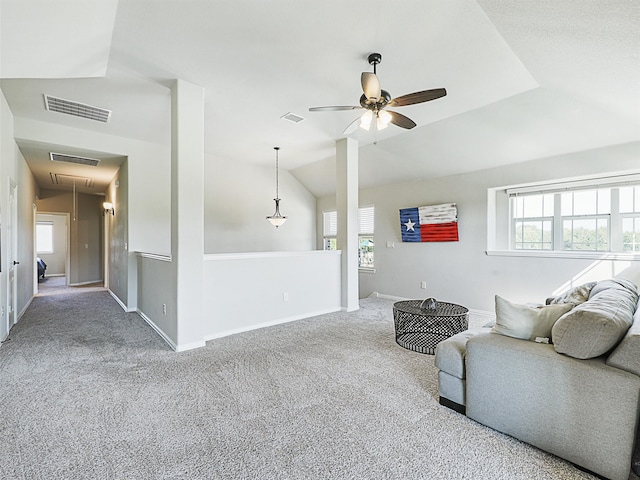 living room featuring lofted ceiling, carpet floors, and ceiling fan