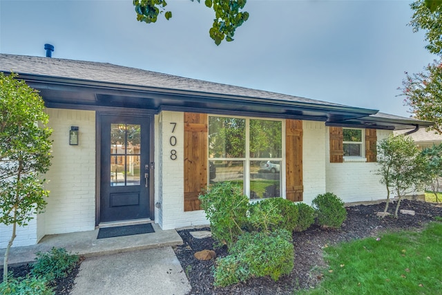 entrance to property with a porch