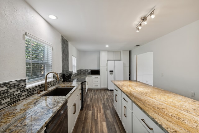 kitchen featuring black appliances, white cabinets, sink, light stone counters, and dark hardwood / wood-style flooring